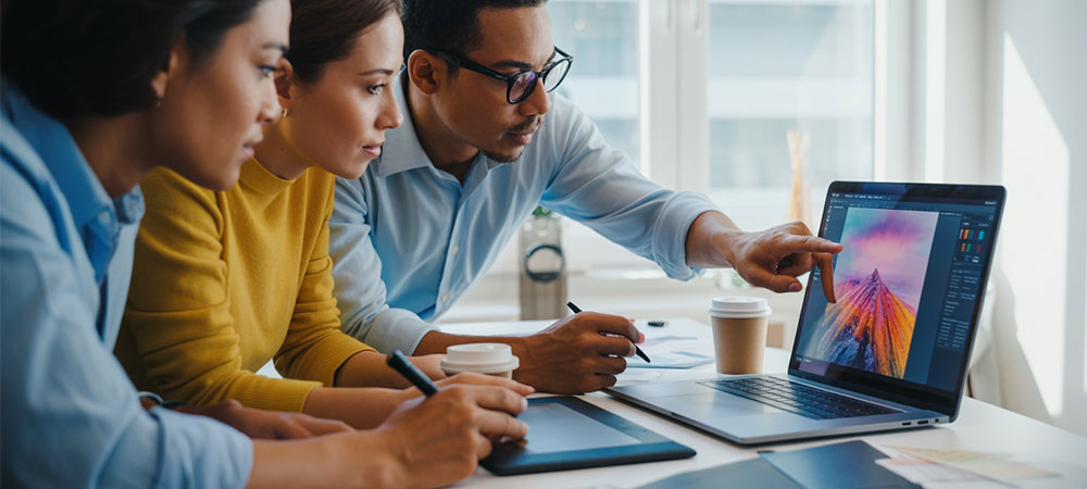 Team editing free stock image on laptop